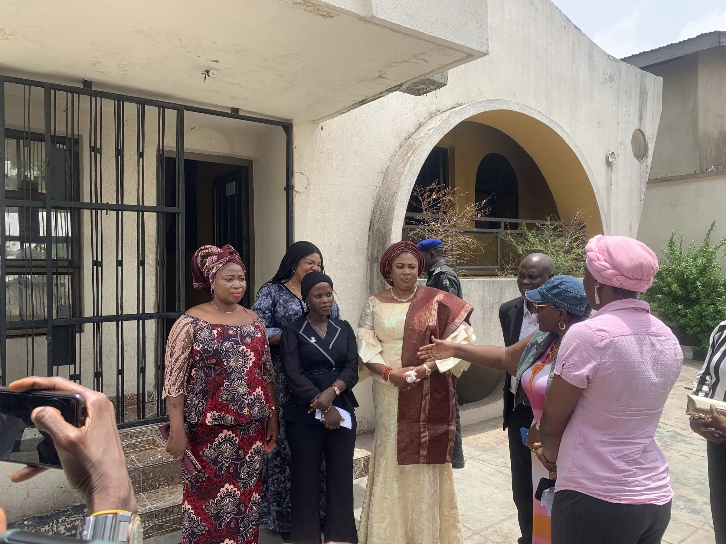 Representatives of Her Excellency's office at the home